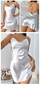 Detail view of white satin cowl neck slip dress with crisscross backless design