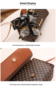 Detail view of vintage monogram bag featuring decorative ribbon and metal magnetic closure