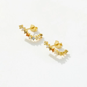 Detailed shot of gold S925 sterling silver hoop earrings with multicolor rainbow gemstones
