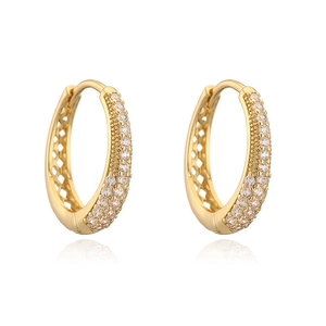 Detailed close-up of luxury gold-plated oval hoop earrings with sparkling white zircons