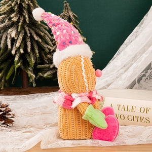 Knitted gingerbread man plush with festive hat and scarf for Christmas home decoration