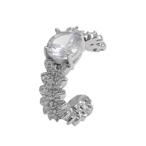 Close-up of silver C-shaped ear cuff featuring a large oval zircon and pavé crystals