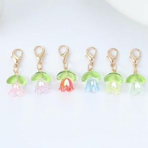 Set of six colorful tulip flower keychains with gold lobster clasps in 80-100 characters.