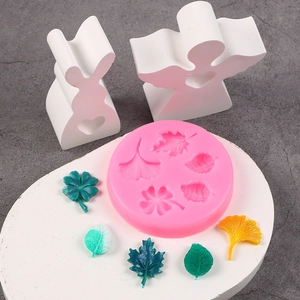 Detailed pink silicone mold for DIY leaf shapes like ginkgo and maple for cake decor