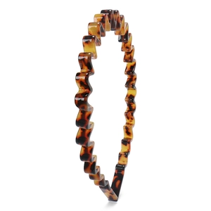 Close-up of tortoise shell pattern acetate wave headband with 8mm thick anti-slip design