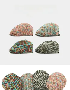Detailed close-up showing textures and patterns of British jacquard beret caps