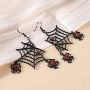 Gothic spider web drop earrings with red crystal spider on elegant silk background