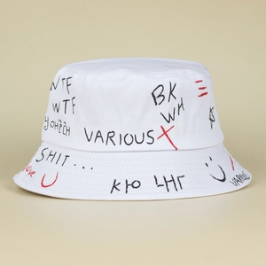 Detail of white cotton bucket hat featuring black and red street style hand-drawn graffiti