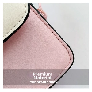 Detail shot of pink and cream patchwork handbag showing fine stitching and leather texture