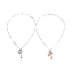 Minimalist geometric irregular round pendant necklaces in silver and rose gold finishes