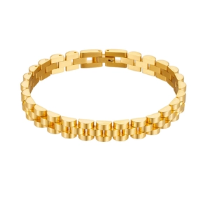 Detail of gold-plated stainless steel watch band bracelet showing polished links