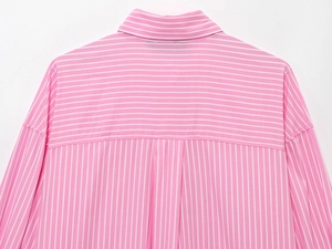 Detail of pink and white striped shirt showing horizontal and vertical stitching at the back