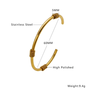 Detailed technical diagram of high polished golden stainless steel twisted open bangle