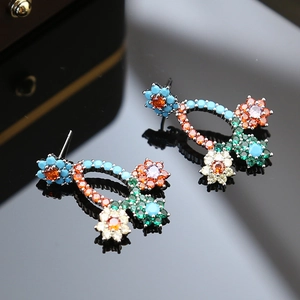 Elegant multi-color zircon flower earrings in S925 silver on black mirror background