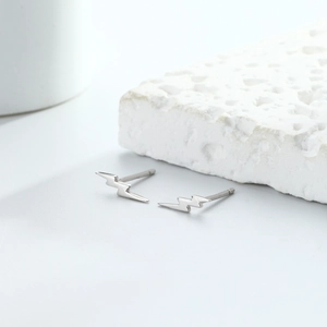 Minimalist S925 sterling silver lightning bolt stud earrings with a polished finish