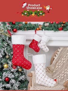 Detailed view of red and white sequined Christmas stockings with faux fur trim