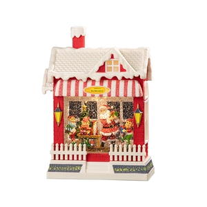 Luminous Santa's Workshop Christmas music box ornament with red brick and snow details