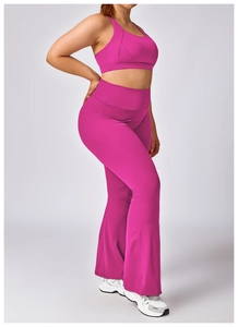 Side view of rose red high-waist flared yoga pants and matching sports vest set