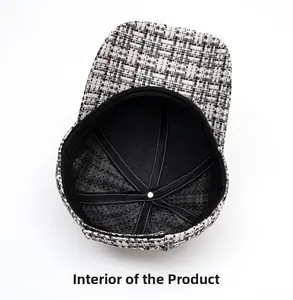 Internal view of tweed baseball cap showing black fabric lining and reinforced stitching