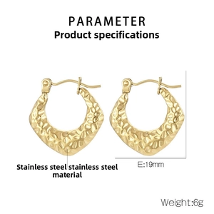 Detail view of gold C-shape earrings showing 19mm size and hammered stainless steel texture