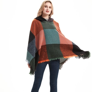 Women's plaid hooded poncho shawl with tassels in vibrant multicolor grid pattern