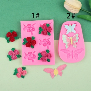 Detailed rose and butterfly silicone molds for fondant clay with finished craft examples