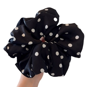 Oversized polka dot hair scrunchie in black satin fabric for elegant hair styling