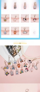 Close-up of cute cartoon rabbit and dog acrylic keychains for backpacks and accessory styling