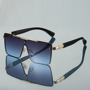 Oversized square sunglasses with gradient blue lenses and gold metal frame for women