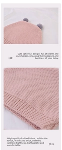 Detail of pink knitted baby hat showing soft texture and cozy warmth features