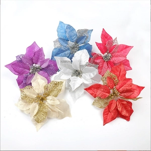 Detail of multi-colored glitter artificial poinsettia flowers for Christmas tree decoration