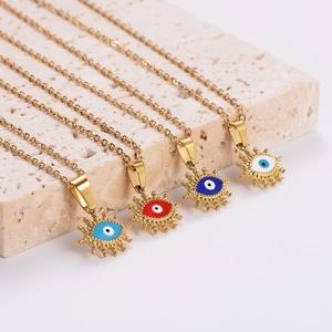 Star-patterned stainless steel necklaces in four colors on a natural stone background
