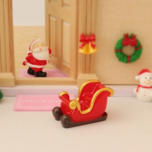 Miniature resin Christmas set with Santa, sleigh, snowman, and welcome mat decor