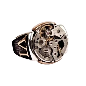 Detailed macro view of steampunk mechanical gear movement and Roman numeral ring
