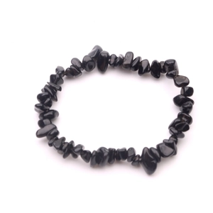 Handmade elastic bracelet with irregular natural black stone beads and polished finish