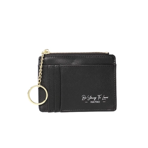 Detail of black cross-grain leather card holder with gold chain and multiple slots