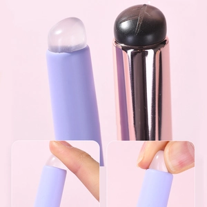 Portable silicone lip brush with soft round head and dual texture handles for smooth makeup
