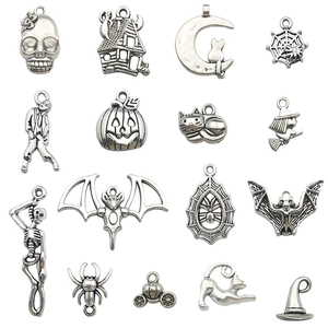 Set of 15 silver alloy Halloween pendants featuring skulls, ghosts, and pumpkins charms