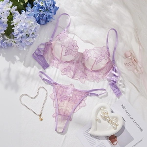 Detail of purple floral lace lingerie set with embroidery on soft mesh fabric