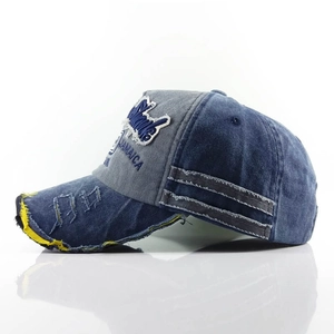 Vintage washed denim baseball cap with Jamaica embroidery and distressed brim detail