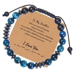 Tiger eye bead bracelet for men with Morse code message card on a white background