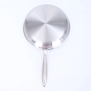 Close-up of the stainless steel frying pan base and heavy-duty handle joint detail