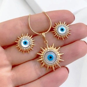 Golden Sun Evil Eye jewelry set with crystal necklace and stud earrings for women