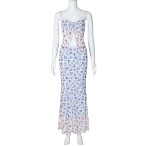 Detail of white mesh floral two-piece set featuring camisole top and fisheye skirt
