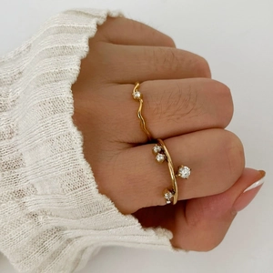 Minimalist 18K gold titanium steel rings set with sparkling zircons and wavy band design