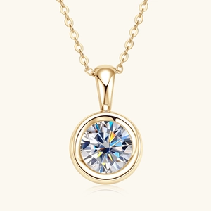 Luxurious S925 sterling silver necklace with a round-cut moissanite pendant in gold finish