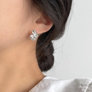 Elegant 925 sterling silver heart-shaped stud earrings in minimalist irregular design