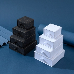 Elegant drawer jewelry gift box set in black and white marble with gold speckles and ribbon