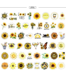 Flat lay of 50pcs sunflower and butterfly stickers for laptops and luggage decoration