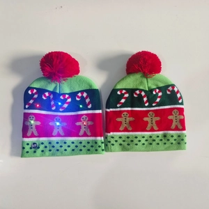 LED Christmas beanie with gingerbread man pattern in light-up and non-light-up modes